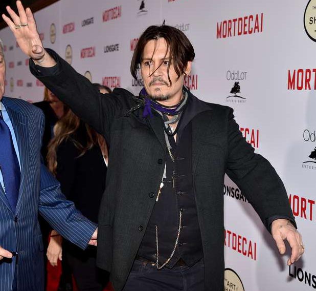 Ator Johnny Depp deixa a Austrália para evitar morte de cães