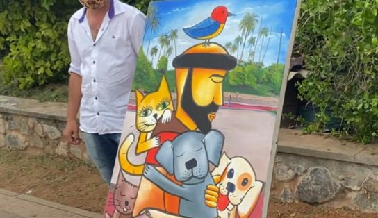 Amor felino: pintor aproveita região da colônia de gatos em Salvador para vender quadros e proteger animais