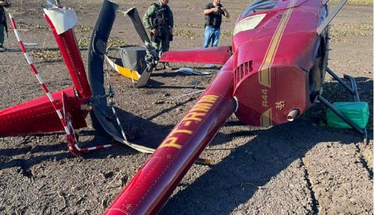 Com quase 300 kg de cocaína, helicóptero cai e tripulação some; aeronave está em nome de policial civil